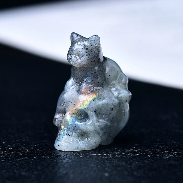 crystal carved cat on skull